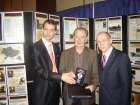 V.Paslavskyi & I.Ostash present the Holodomor CDROM to Preston Manning