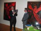 V.Paslavskyi explains to  D.Caron about the Holodomor exhibit in CDROM searchable format 