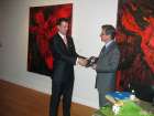 V.Paslavskyi, Execurive Director of LUC presents a CDROM to D.Caron, the Ambassador of Canada to Ukraine